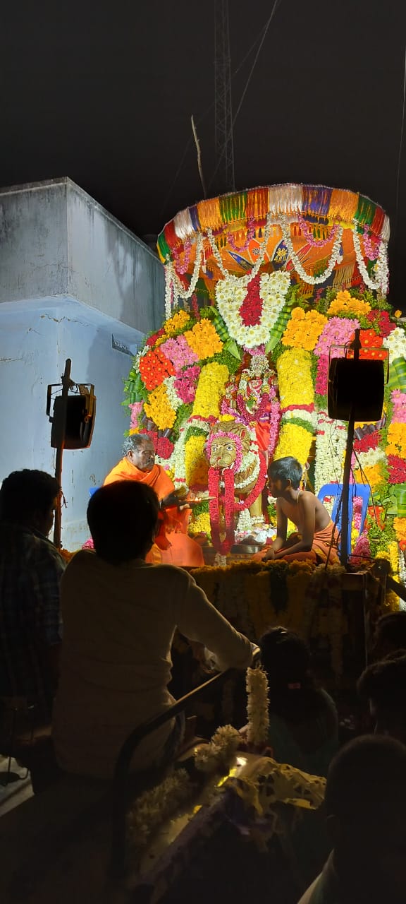 Devotees attending night aarti