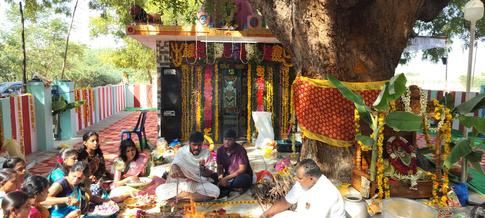 Homam ceremony with devotees at the temple
