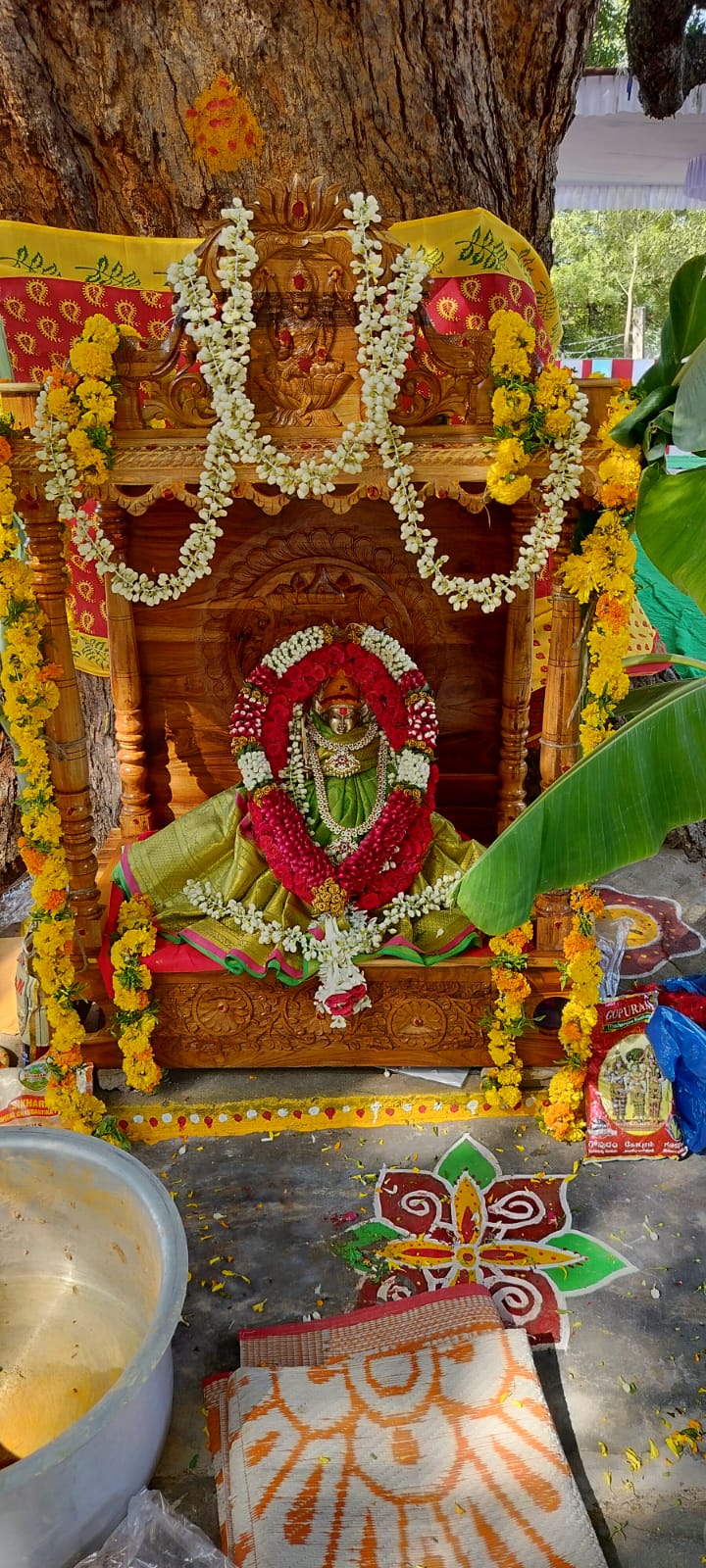 Decorated temple shrine under the sacred tree
